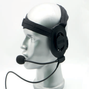 White mannequin head wearing a black VR headset with a strap across the top and round ear cups.